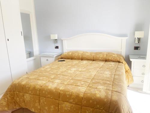 Postel nebo postele na pokoji v ubytování Hotel Ristorante Colleverde