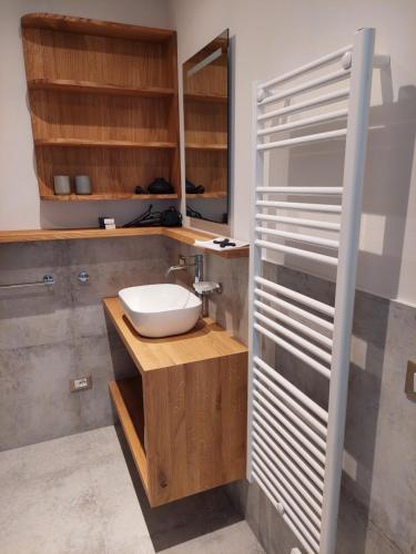 a bathroom with a sink and a mirror at Crandola in Oira