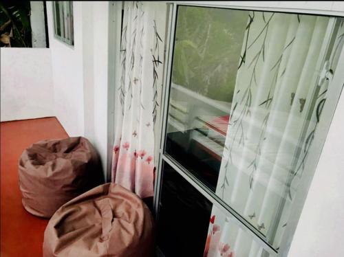 Postel nebo postele na pokoji v ubytování Minthu Homestay