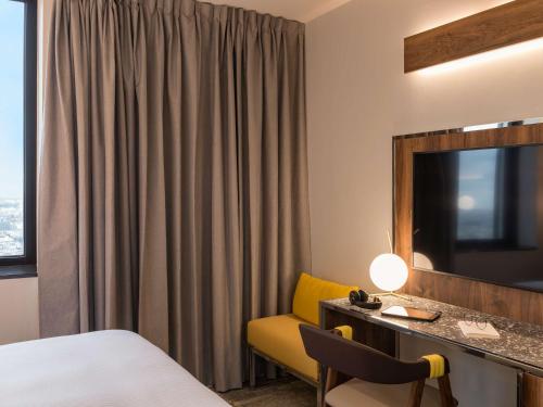 Katil atau katil-katil dalam bilik di Pullman Paris Montparnasse