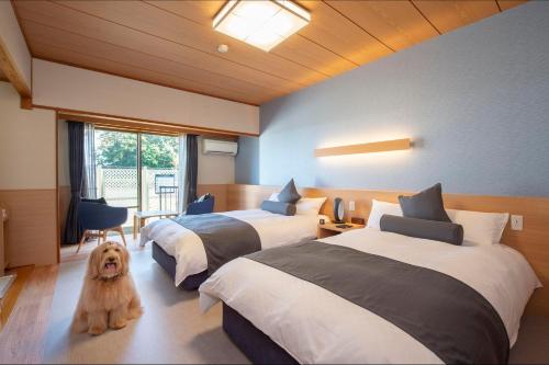 Postel nebo postele na pokoji v ubytování Wan's Resort Jogasaki