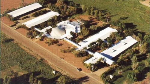 an overhead view of a large building with a road at Albert Park Motor Inn in Longreach