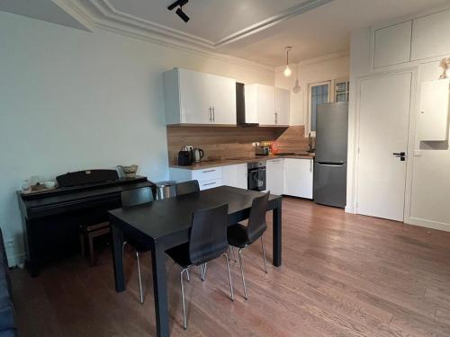 Photo de la galerie de l'établissement GoodGuest-Cozy and Quiet Batignolles Bail Mobilité, à Paris