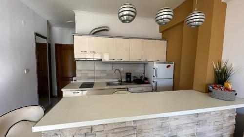 Kuchyň nebo kuchyňský kout v ubytování Gouris Appartements