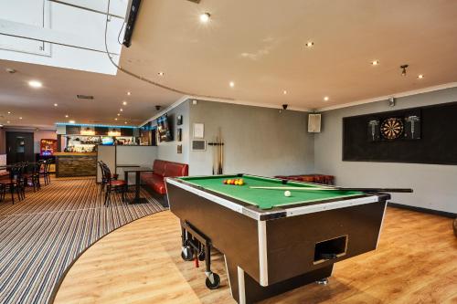a billiard room with a pool table in it at Campsie Glen Holiday Park in Glasgow