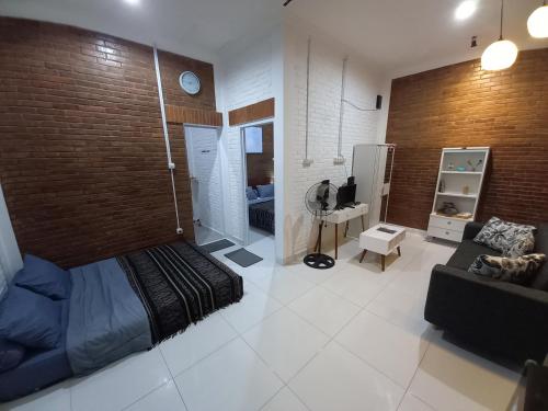 Χώρος καθιστικού στο Guest House B