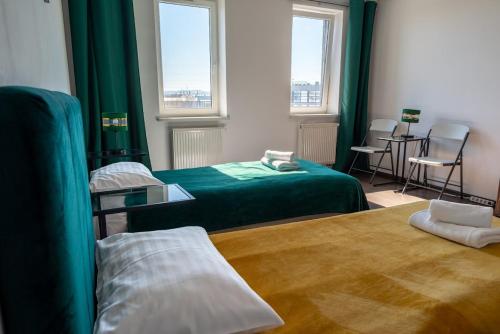 Postel nebo postele na pokoji v ubytování Hotel Świt