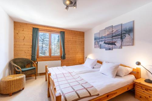 Ένα ή περισσότερα κρεβάτια σε δωμάτιο στο Esperanza SKI IN & SKI OUT chalet 8 pers