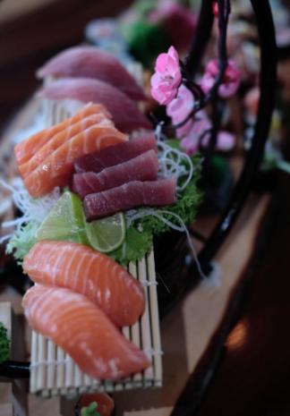 a plate of sushi with carrots and other vegetables at Hotel Schloßschenke in Idar-Oberstein