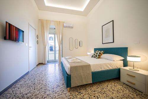 MH Suites Rooms Apartmentsにあるベッド
