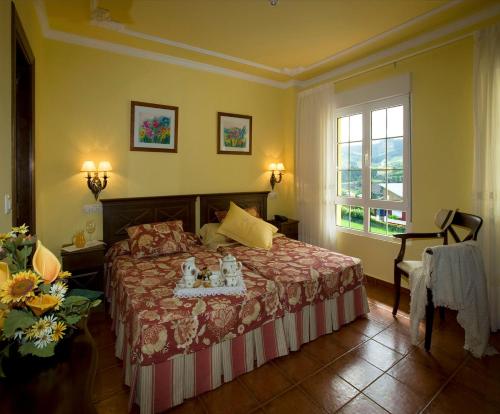 Ένα ή περισσότερα κρεβάτια σε δωμάτιο στο Hotel Boutique El Pescador
