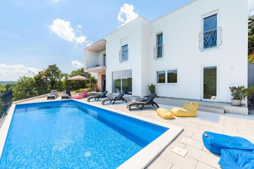 an image of a villa with a swimming pool at Villa Manola by Briskva in Labin