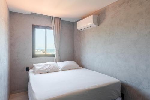 En eller flere senge i et værelse på Flat Porto de Galinhas Square 05