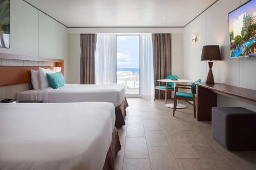 Un ou plusieurs lits dans un hébergement de l'établissement Sonesta Maho Beach All Inclusive Resort Casino & Spa