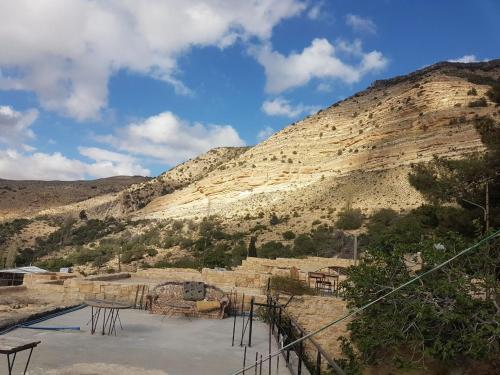 a view of a hill with a mountain at Dana moon hostel in Dana