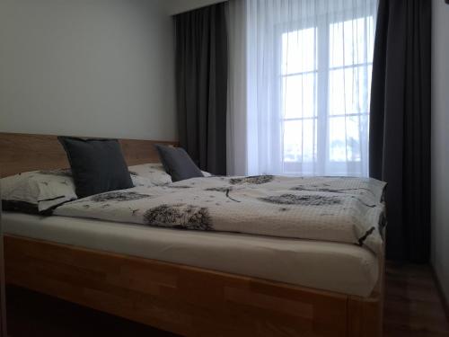 Postel nebo postele na pokoji v ubytování Apartmány Lumi