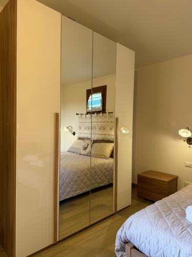 Ένα ή περισσότερα κρεβάτια σε δωμάτιο στο B&B Casa Cruccas