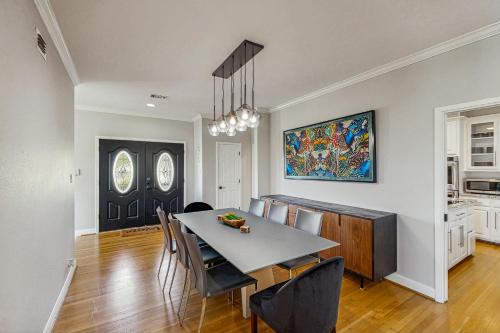 a kitchen and dining room with a table and chairs at Sailfish Sanctuary in Lakeway