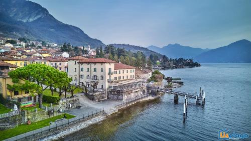 a town on the shore of a body of water at Blue Heaven in Lierna