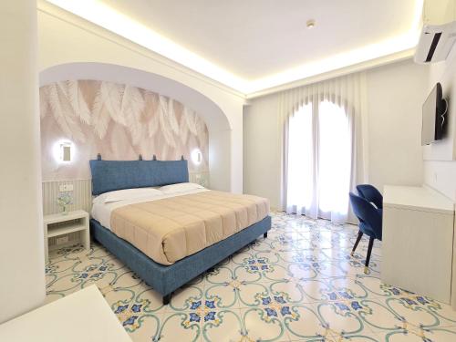 A bed or beds in a room at Villa Le Zagare Relais & SPA