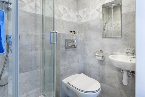 Koupelna v ubytování Pokoje, Apartamenty, Domki nad Morzem Dune Resort Łeba