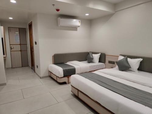Postel nebo postele na pokoji v ubytování Hotel Kozar