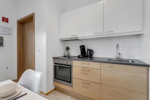a kitchen with a sink and a counter top at Blue Mountain Apartments by Heimaleiga in Reykjavík