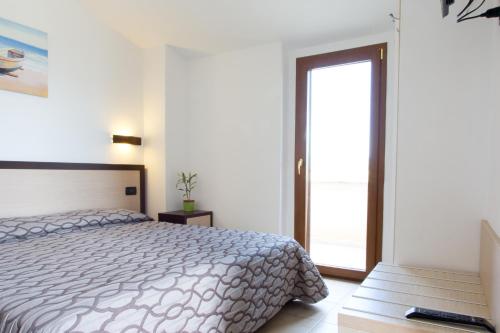 Albergo Il Giardinoにあるベッド