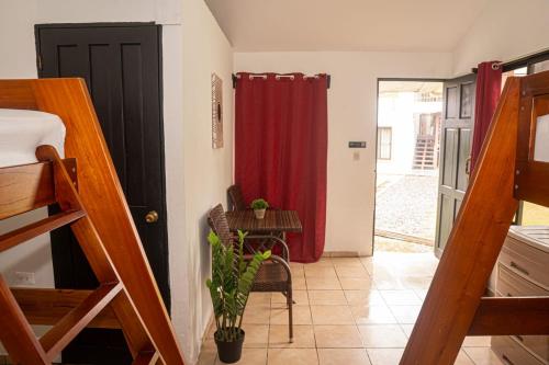 Кровать или кровати в номере Hotel Vive Uvita
