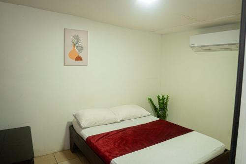 Кровать или кровати в номере Hotel Vive Uvita