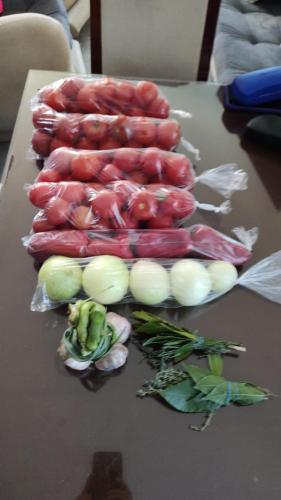 a group of vegetables sitting on a table at Quinta Divina Providencia in Fusagasuga