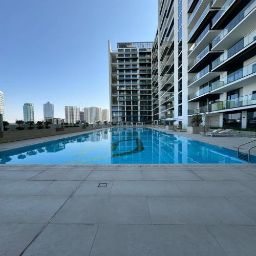 Luxurious Belvilla 1BR JVC with Pool, Gym & BBQ Access