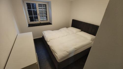Postel nebo postele na pokoji v ubytování Stadthof Haus