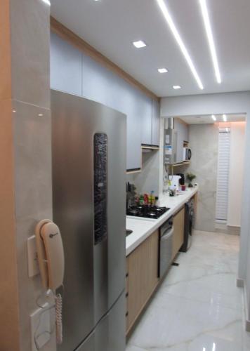 Kuchyň nebo kuchyňský kout v ubytování Quarto Apt AirPort GRU Congonhas Cumbica Poupatempo Shopping Internacional SP A Melhor localização perto da grande São Paulo