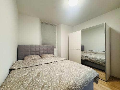Postel nebo postele na pokoji v ubytování Haus Simplon