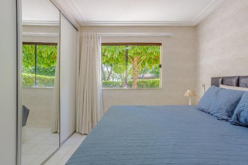 Katil atau katil-katil dalam bilik di GB121 Lindo Apartamento com 3 Suítes - Guarajuba