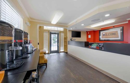 a kitchen with a counter in a restaurant at Extended Stay America Suites - Los Angeles - LAX Airport - El Segundo in El Segundo