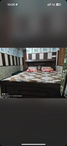 a picture of a bed in a room at Hotel sindh view and restaurant in Kulan