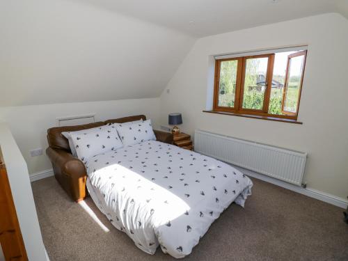 En eller flere senge i et værelse på Little Barn