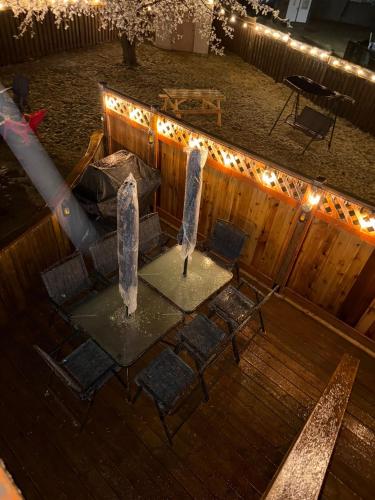 an overhead view of a patio with chairs and lights at Happy Life in Barrie