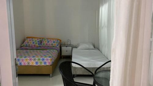 Ένα ή περισσότερα κρεβάτια σε δωμάτιο στο Casa WHITE