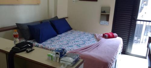 Katil atau katil-katil dalam bilik di Flat Apart Service próximo a praia