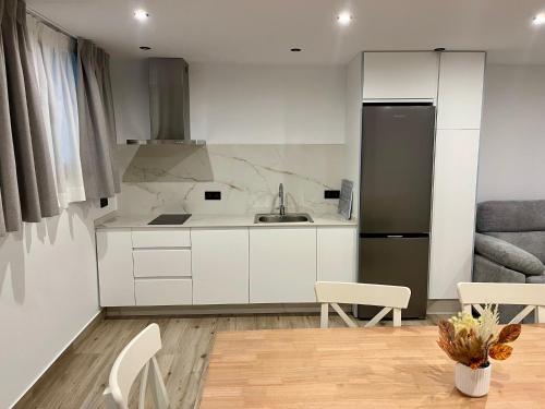 Η κουζίνα ή μικρή κουζίνα στο Apartamentos HORNOS