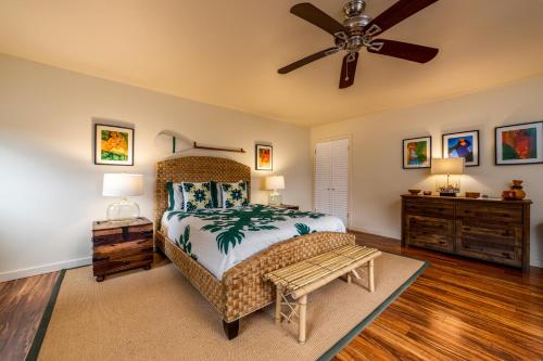 Postel nebo postele na pokoji v ubytování Iokua Hale