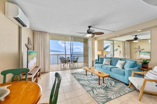 a living room with a couch and a table at Maalaea Kai 315 in Wailuku