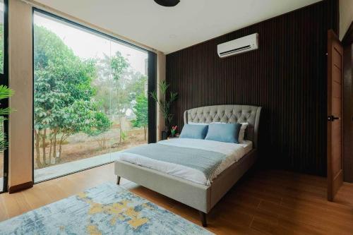 Кровать или кровати в номере Katsetiu Villas