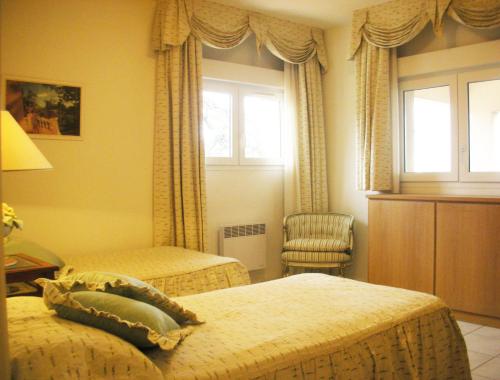 Posteľ alebo postele v izbe v ubytovaní Villa Ginevra