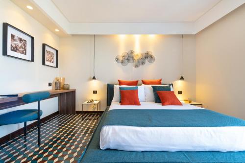 Ένα ή περισσότερα κρεβάτια σε δωμάτιο στο Sorrento-luxury Suites
