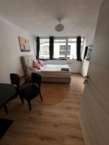 Ένα ή περισσότερα κρεβάτια σε δωμάτιο στο Bade Appartements
