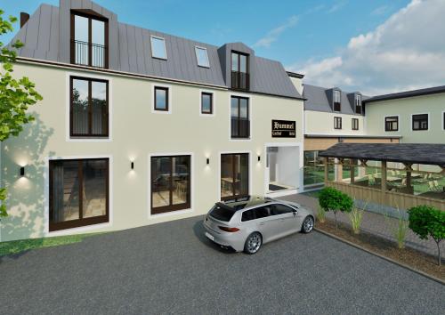 a rendering of a house with a car parked in front at Gasthof Hummel Hotel in Stammham
